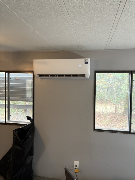 Wall-mounted ductless mini-split indoor head unit installed by K&K ProBuild