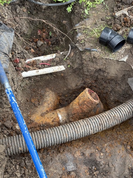 Sewer line tie-in with a new clean-out during a 100-foot sewer addition for an ADU
